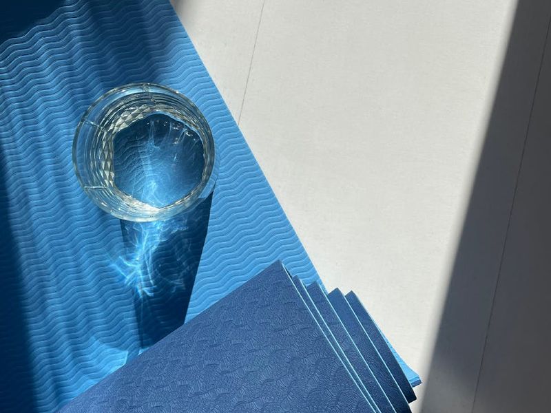 Bright and airy room with a yoga mat on the floor.